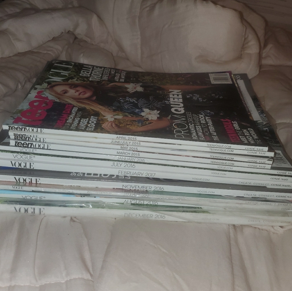 11 Vogue magazines